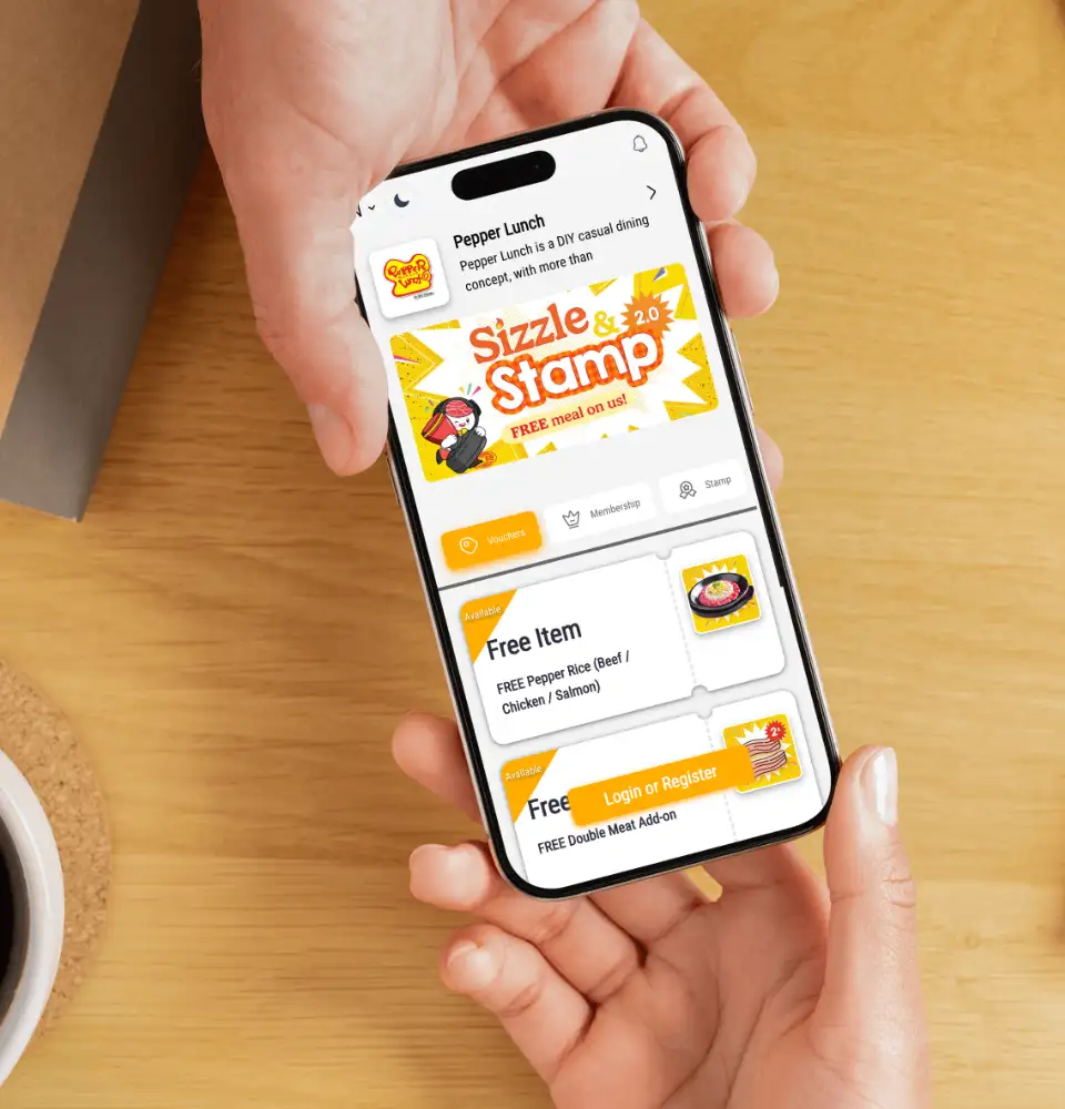 Customer viewing a Pepper Lunch branded membership, voucher and stamp experience on a phone